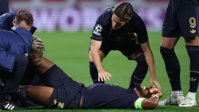 Juventus' Brazilian defender #03 Bremer lies on the football pitch after picking up an injury during the UEFA Champions League football match between RB Leipzig and Juventus FC at the Red Bull Arena in Leipzig on October 2, 2024.