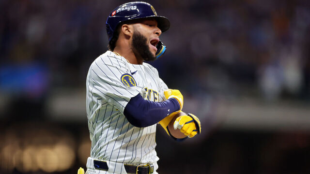 MILWAUKEE, WISCONSIN - OCTOBER 02: Jackson Chourio #11 of the Milwaukee Brewers celebrates after hitting a home run in the eighth inning against the New York Mets during Game Two of the Wild Card Series at American Family Field on October 02, 2024 in Milwaukee, Wisconsin.