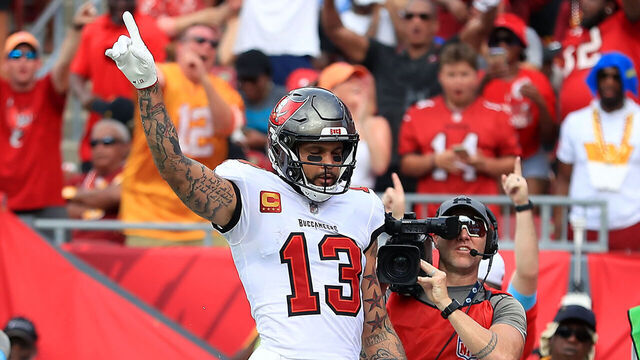 TAMPA, FL - SEPTEMBER 08: Tampa Bay Buccaneers Wide Receiver Mike Evans (13) celebrates a touchdown catch during the game between the Washington Commanders and the Tampa Bay Buccaneers on September 08, 2024 at Raymond James Stadium in Tampa, Florida.