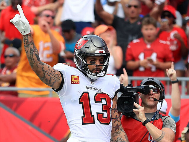 TAMPA, FL - SEPTEMBER 08: Tampa Bay Buccaneers Wide Receiver Mike Evans (13) celebrates a touchdown catch during the game between the Washington Commanders and the Tampa Bay Buccaneers on September 08, 2024 at Raymond James Stadium in Tampa, Florida.