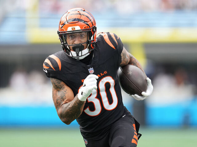 CHARLOTTE, NORTH CAROLINA - SEPTEMBER 29: Chase Brown #30 of the Cincinnati Bengalsruns the ball against the Carolina Panthers during the game at Bank of America Stadium on September 29, 2024 in Charlotte, North Carolina.