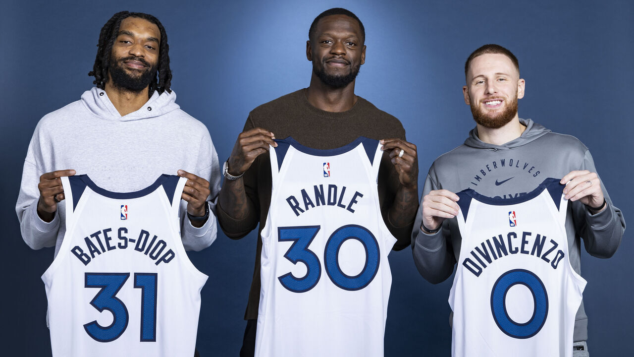 MINNEAPOLIS, MN - OCTOBER 3: Keita Bates-Diop #31, Julius Randle #30 and Donte DiVincenzo #0 of the Minnesota Timberwolves pose for a portrait on October 3, 2024 at Target Center in Minneapolis, Minnesota. Mandatory Copyright Notice: Copyright 2024 NBAE