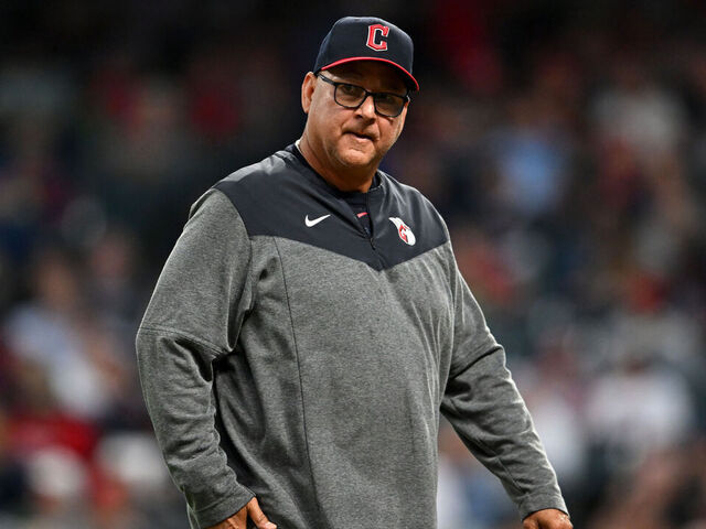 CLEVELAND, OHIO - SEPTEMBER 26, 2023: Manager Terry Francona #77 of the Cleveland Guardians walks off the field after making a pitching change during the fourth inning against the Cincinnati Reds at Progressive Field on September 26, 2023 in Cleveland, Ohio.