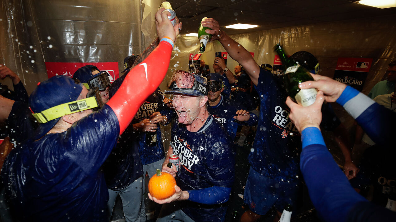 MILWAUKEE, WI - OCTOBER 03: Pete Alonso #20 of the New York Mets celebrates with teammates in the clubhouse after defeating the Milwaukee Brewers in Game 3 of the Wild Card Series presented by T-Mobile 5G Home Internet at American Family Field on Thursday, October 3, 2024 in Milwaukee, Wisconsin.