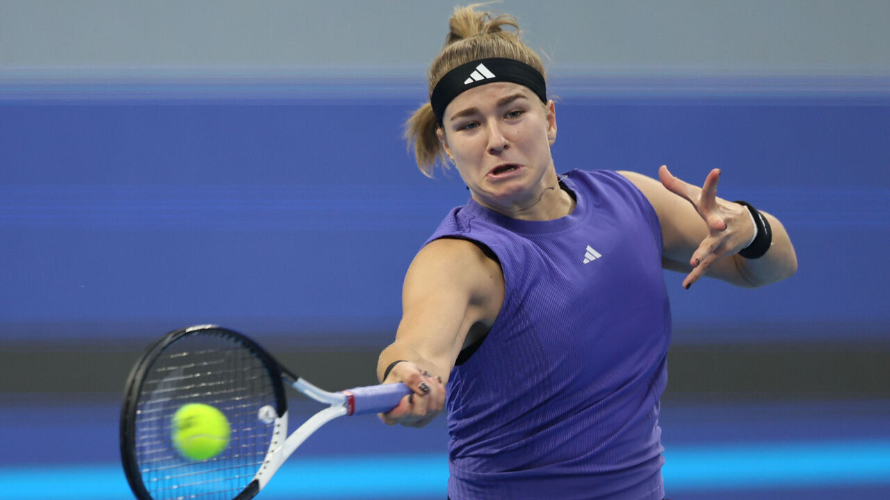 BEIJING, CHINA - OCTOBER 04: Karolina Muchova of the Czech Republic returns a shot against Aryna Sabalenka during the women's singles quarterfinal match on Day 12 of the China Open at National Tennis Center on October 04, 2024 in Beijing, China.