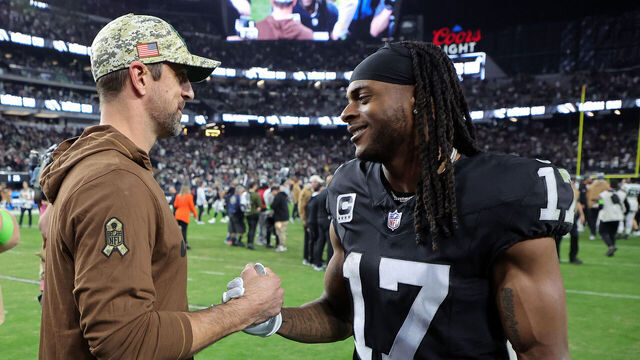 LAS VEGAS, NEVADA - NOVEMBER 12: Quarterback Aaron Rodgers #8 of the New York Jets talks with wide receiver Davante Adams #17 of the Las Vegas Raiders after the Raiders defeated the Jets to win the game at Allegiant Stadium on November 12, 2023 in Las Vegas, Nevada.