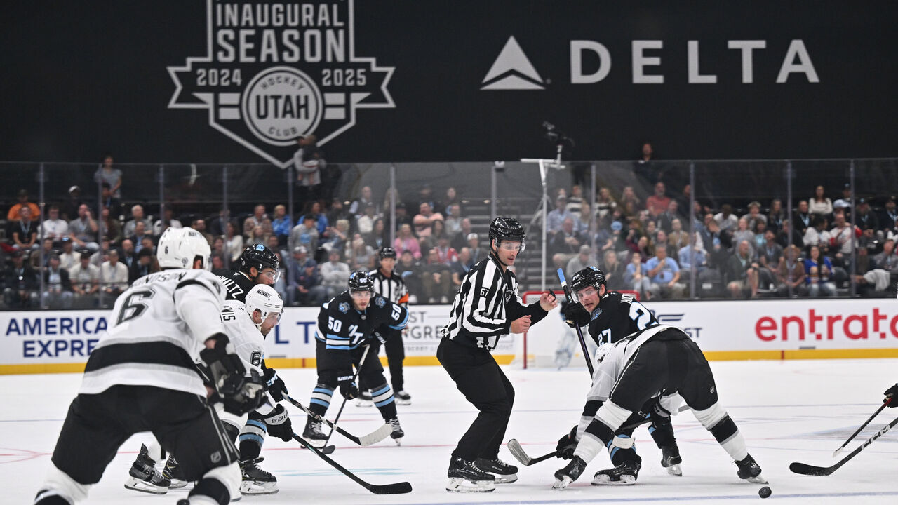 SALT LAKE CITY, UTAH - SEPTEMBER 23: Barrett Hayton #27 of the Utah Hockey Club takes a face off against the Los Angeles Kings in the third period of a preseason game on September 23, 2024 at Delta Center in Salt Lake City, Utah.