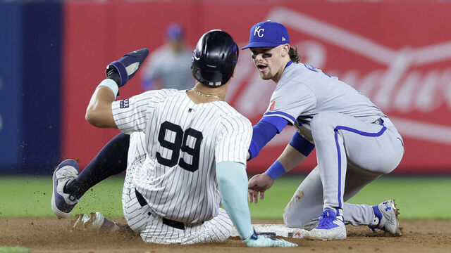 NEW YORK, NEW YORK - SEPTEMBER 09: Bobby Witt Jr. #7 of the Kansas City Royals in action against Aaron Judge #99 of the New York Yankees at Yankee Stadium on September 09, 2024 in New York City. The Yankees defeated the Royals 10-4.