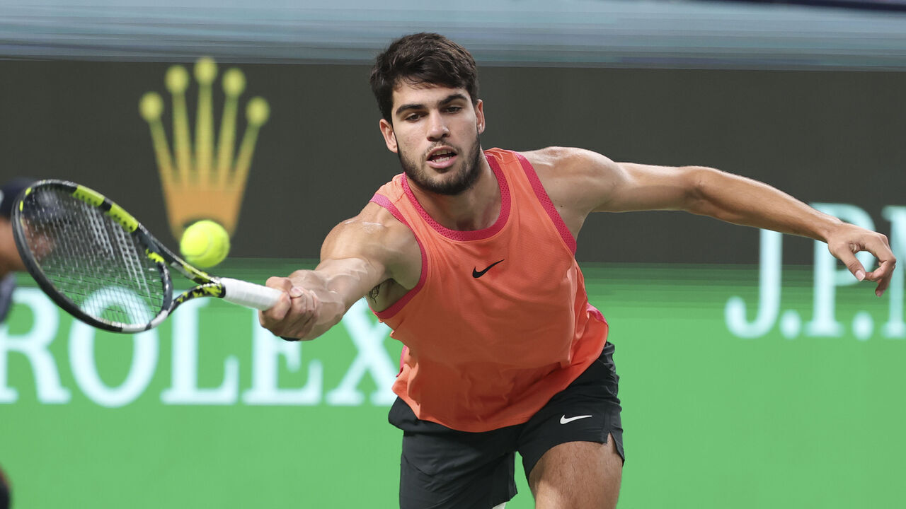 SHANGHAI, CHINA - OCTOBER 05: Carlos Alcaraz of Spain returns a shot in the Men's singles 2nd Round match against Juncheng Shang of China on Day 6 of 2024 Shanghai Rolex Masters at Qi Zhong Tennis Centre on October 05, 2024 in Shanghai, China.