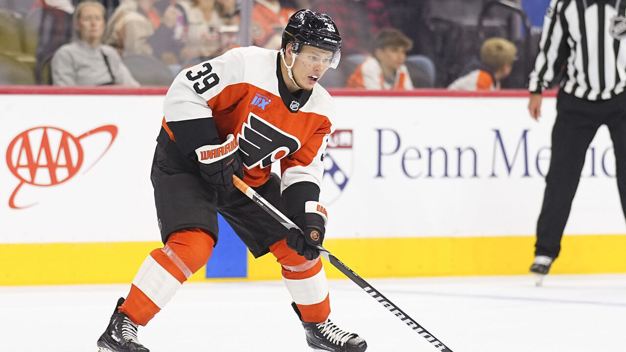 PHILADELPHIA, PENNSYLVANIA - SEPTEMBER 28: Matvei Michkov #39 of the Philadelphia Flyers controls the puck against the Boston Bruins during the preseason game at the Wells Fargo Center on September 28, 2024 in Philadelphia, Pennsylvania.