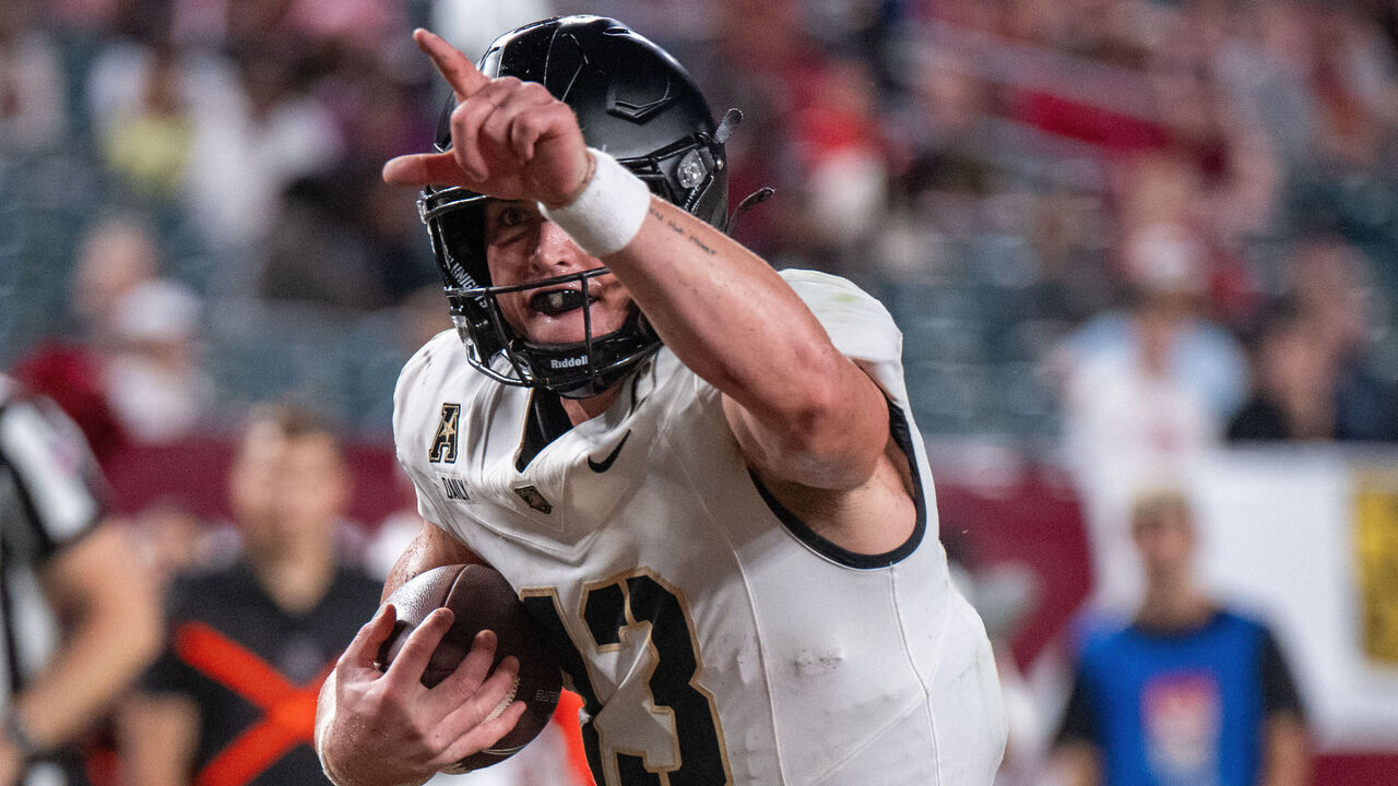 PHILADELPHIA, PA - SEPTEMBER 26: Army Black Knights quarterback Bryson Daily (13) scores a second touchdown during the game between the Army Black Knights and the Temple Owls on September 26th, 2024 at Lincoln Financial Field in Philadelphia, PA.
