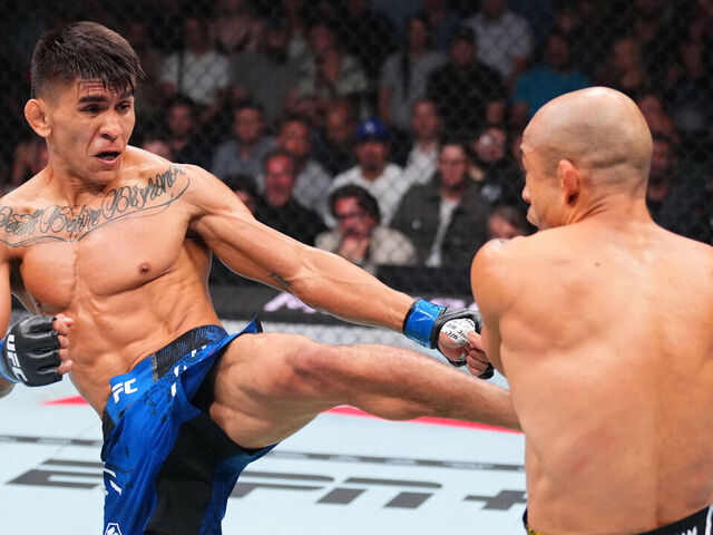 SALT LAKE CITY, UTAH - OCTOBER 05: (L-R) Mario Bautista kicks Jose Aldo of Brazil in a bantamweight fight during the UFC 307 event at Delta Center on October 05, 2024 in Salt Lake City, Utah.