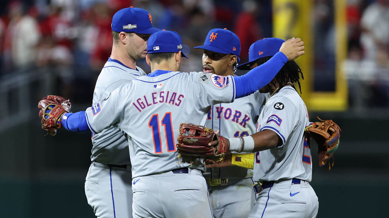 PHILADELPHIA, PA - OCTOBER 05: Jose Iglesias #11, Pete Alonso #20, Francisco Lindor #12 and Luisangel Acuña #2 of the New York Mets celebrate after winning Game 1 of the Division Series presented by Booking.com between the New York Mets and the Philadelphia Phillies at Citizens Bank Park on Saturday, October 5, 2024 in Philadelphia, Pennsylvania.