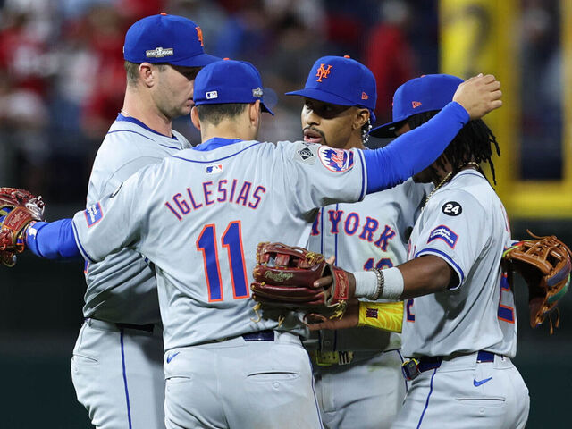 PHILADELPHIA, PA - OCTOBER 05: Jose Iglesias #11, Pete Alonso #20, Francisco Lindor #12 and Luisangel Acuña #2 of the New York Mets celebrate after winning Game 1 of the Division Series presented by Booking.com between the New York Mets and the Philadelphia Phillies at Citizens Bank Park on Saturday, October 5, 2024 in Philadelphia, Pennsylvania.