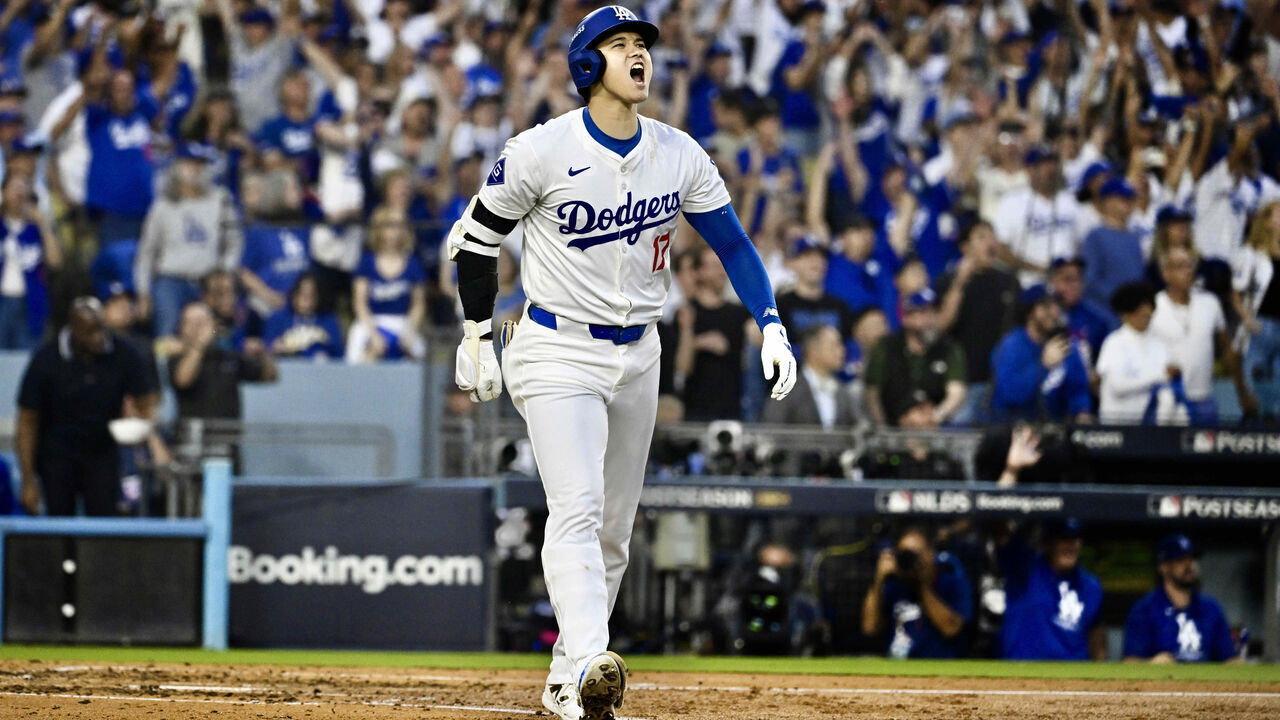 Los Angeles, CA - October 05: Shohei Ohtani #17 of the Los Angeles Dodgers reacts after hitting a three run home run against the San Diego Padres in the second inning of game 1 of a National League Division Series playoff baseball game at Dodger Stadium on Saturday, October 5, 2024.