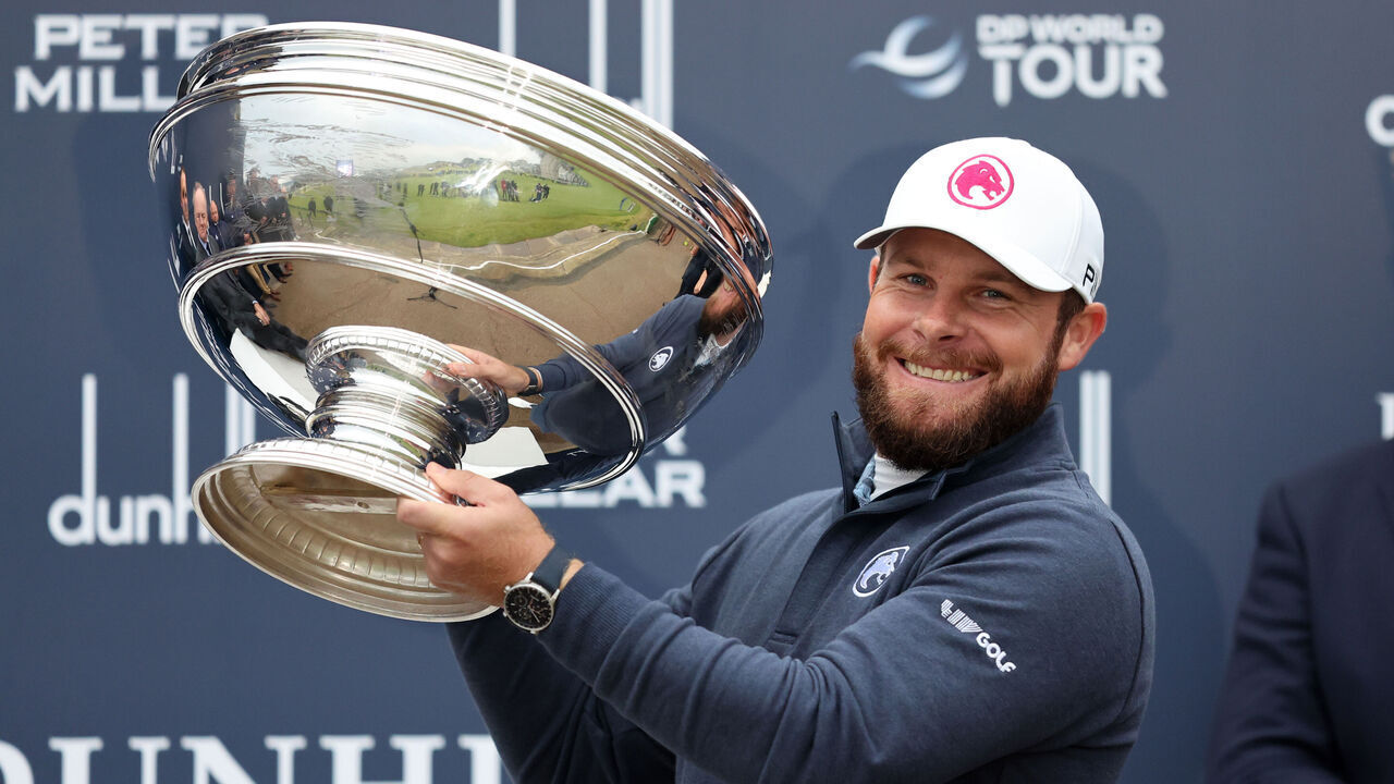 Tyrrell Hatton celebrates with the trophy after winning on day Four of the Alfred Dunhill Links Championship, at the Old Course St. Andrews. Picture date: Sunday October 6, 2024.