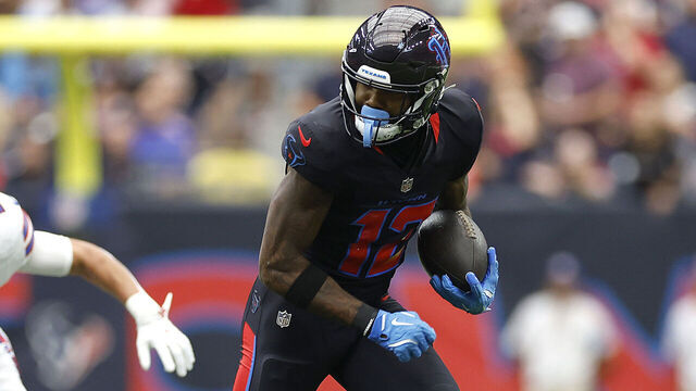HOUSTON, TEXAS - OCTOBER 06: Nico Collins #12 of the Houston Texans runs after a catch during the first quarter against the Buffalo Bills at NRG Stadium on October 06, 2024 in Houston, Texas.