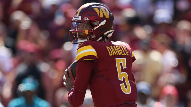LANDOVER, MARYLAND - OCTOBER 06: Jayden Daniels #5 of the Washington Commanders throws a pass against the Cleveland Browns during the second quarter at FedExField on October 06, 2024 in Landover, Maryland.