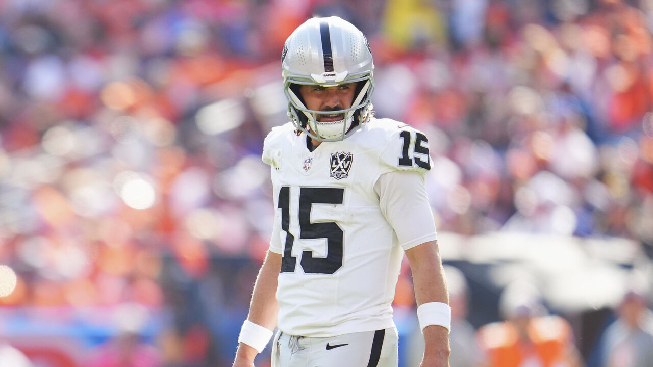 DENVER, CO - OCTOBER 06: Gardner Minshew #15 of the Las Vegas Raiders looks towards the sideline during the first half of an NFL football game against the Denver Broncos at Empower Field at Mile High on October 6, 2024 in Denver, Colorado.