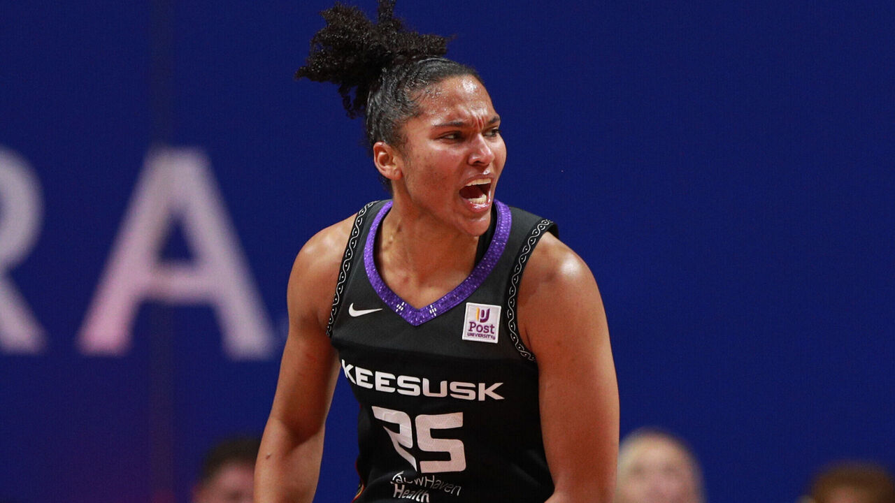 UNCASVILLE, CT - OCTOBER 6: Alyssa Thomas #25 of the Connecticut Sun celebrates during the game against the Minnesota Lynx during Round Two Game Four of the 2024 WNBA Playoffs on October 6, 2024 at the Mohegan Sun Arena in Uncasville, Connecticut. Mandatory Copyright Notice: Copyright 2024 NBAE