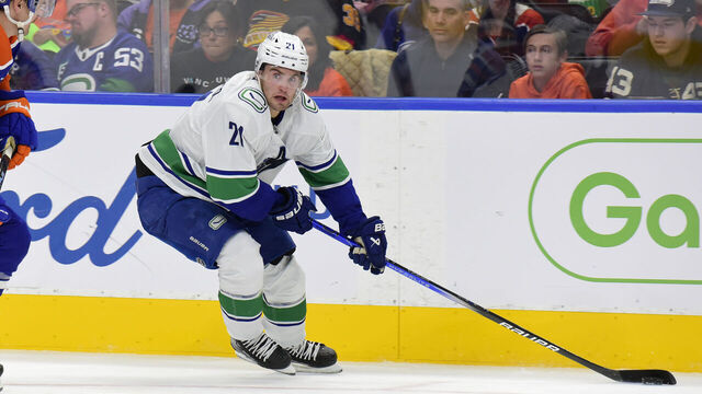 EDMONTON, CANADA SEPTEMBER 30: Nils Hoglander #21 of the Vancouver Canucks in action during the preseason game against the Edmonton Oilers at Rogers Place on September 30, 2024, in Edmonton, Alberta, Canada.