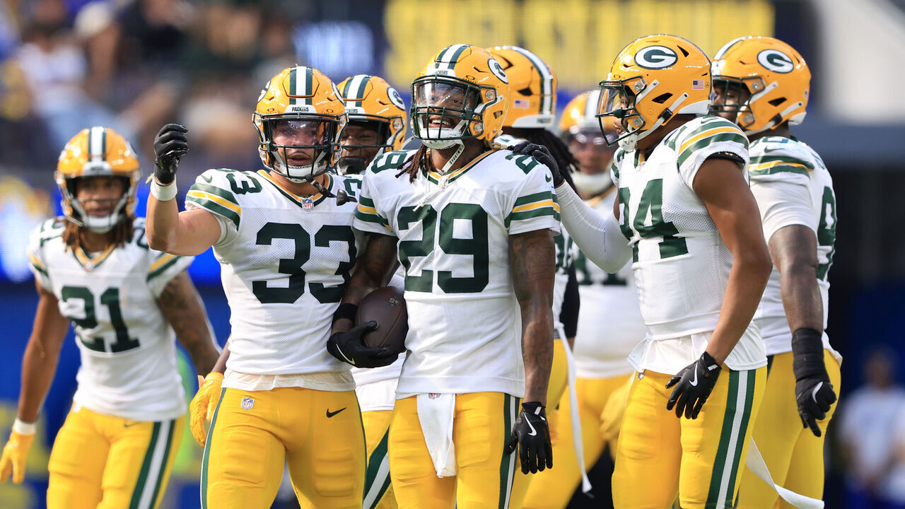 INGLEWOOD, CALIFORNIA - OCTOBER 06: Xavier McKinney #29 of the Green Bay Packers celebrates with teammates after an interception against the Los Angeles Rams during the third quarter at SoFi Stadium on October 06, 2024 in Inglewood, California.