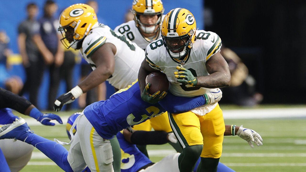 INGLEWOOD, CALIFORNIA - OCTOBER 06: Josh Jacobs #8 of the Green Bay Packers runs the ball at SoFi Stadium on October 06, 2024 in Inglewood, California.