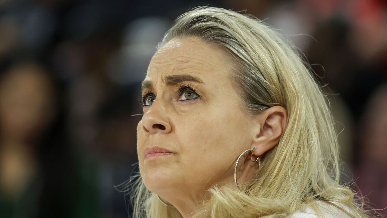 LAS VEGAS, NEVADA - OCTOBER 04: Head coach Becky Hammon of the Las Vegas Aces looks on before Game Three of the 2024 WNBA Playoffs semifinals against the New York Liberty at Michelob ULTRA Arena on October 04, 2024 in Las Vegas, Nevada. The Aces defeated the Liberty 95-81.