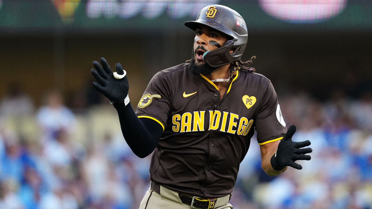 LOS ANGELES, CA - OCTOBER 06: Fernando Tatis Jr. #23 of the San Diego Padres celebrates after hitting a solo home run in the first inning during Game 2 of the Division Series presented by Booking.com between the San Diego Padres and the Los Angeles Dodgers at Dodger Stadium on Sunday, October 6, 2024 in Los Angeles, California.