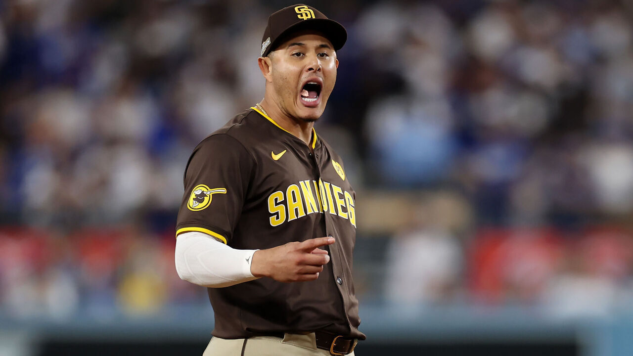 LOS ANGELES, CALIFORNIA - OCTOBER 06: Manny Machado #13 of the San Diego Padres reacts towards the Los Angeles Dodgers bench in the seventh inning during Game Two of the Division Series at Dodger Stadium on October 06, 2024 in Los Angeles, California.