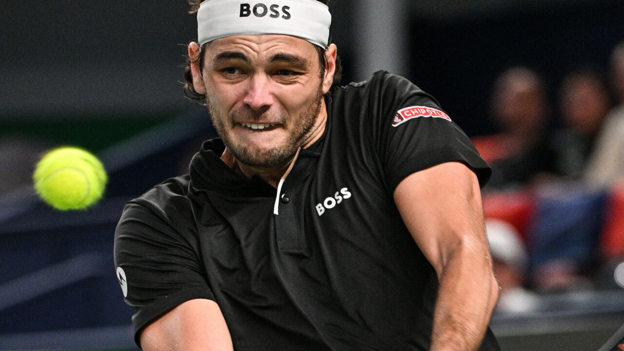 Taylor Fritz of the US hits a return to France's Terence Atmane during their men's singles match at the Shanghai Masters tennis tournament in Shanghai on October 7, 2024.