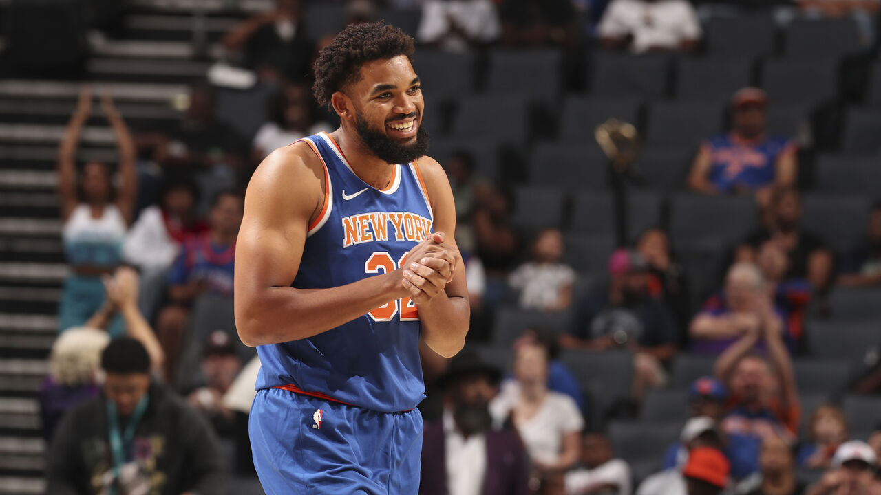 CHARLOTTE, NC - OCTOBER 22: Karl-Anthony Towns #32 of the New York Knicks smiles during an NBA preseason game on October 22, 2024 at Spectrum Center in Charlotte, North Carolina. Mandatory Copyright Notice: Copyright 2024 NBAE
