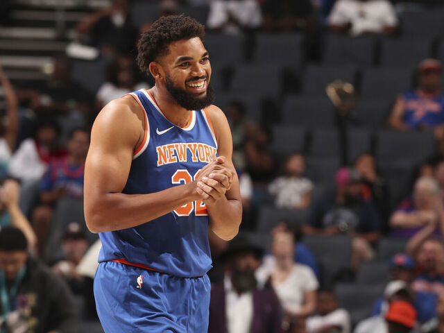 CHARLOTTE, NC - OCTOBER 22: Karl-Anthony Towns #32 of the New York Knicks smiles during an NBA preseason game on October 22, 2024 at Spectrum Center in Charlotte, North Carolina. Mandatory Copyright Notice: Copyright 2024 NBAE