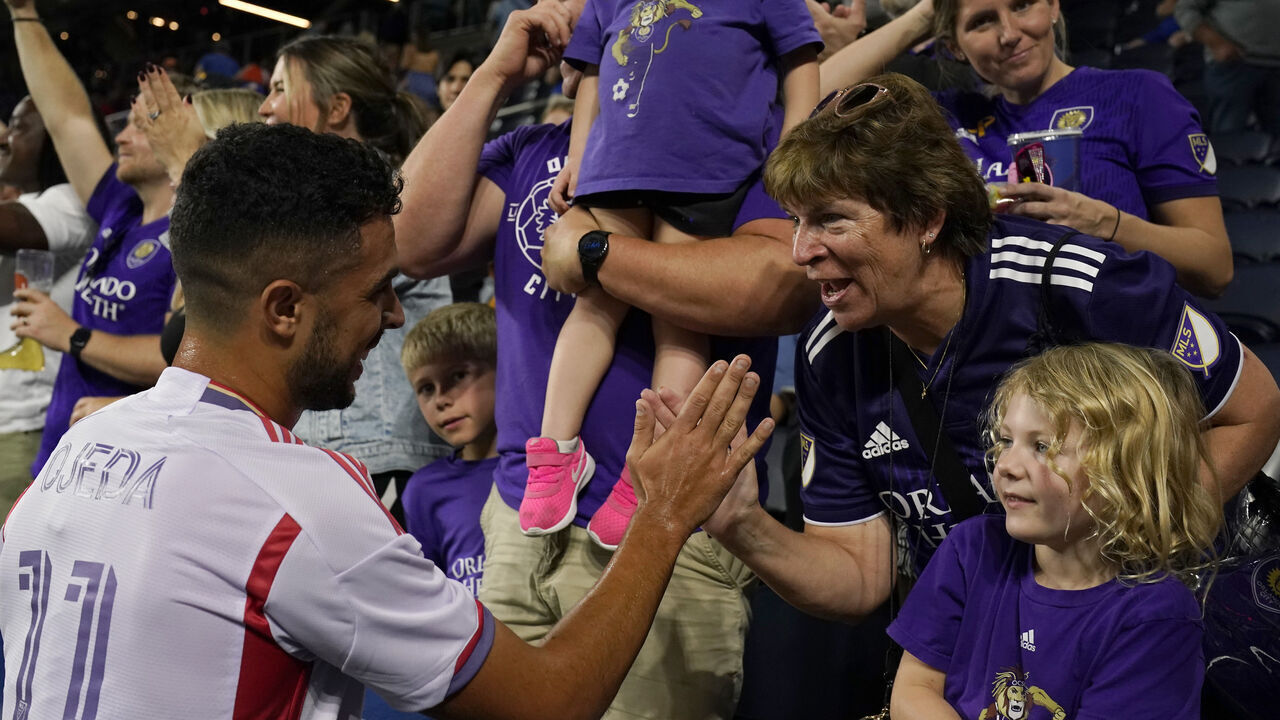 CINCINNATI, OHIO - OCTOBER 05: Martín Ojeda #11 of Orlando City celebrates with supporters following the team's 3-1 victory over FC Cincinnati in an MLS soccer match at TQL Stadium on October 05, 2024 in Cincinnati, Ohio.
