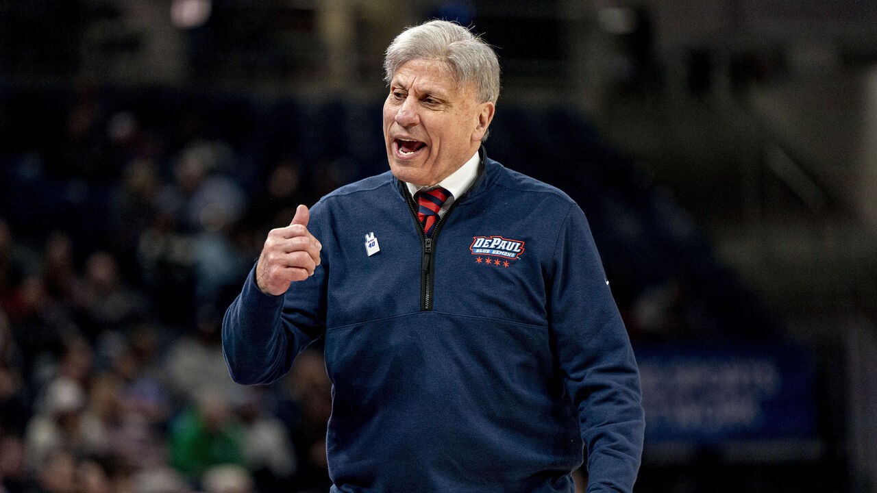 CHICAGO, IL - FEBRUARY 25: DePaul Blue Demons head coach Doug Bruno shouts at a player to sub in during the women's college basketball game between the UConn Huskies and the Depaul Blue Demons on February 25, 2024, at Wintrust Arena in Chicago, IL.