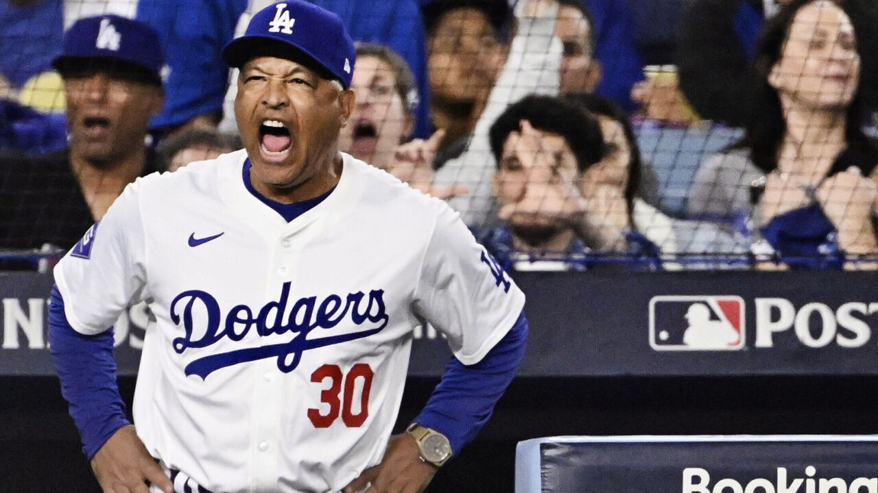 Los Angeles, CA - October 05: Manager Dave Roberts of the Los Angeles Dodgers reacts towards the home plate umpire in the eighth inning of game 1 of a National League Division Series playoff baseball game against the San Diego Padres at Dodger Stadium on Saturday, October 5, 2024.