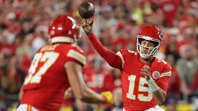 KANSAS CITY, MISSOURI - OCTOBER 07: Patrick Mahomes #15 of the Kansas City Chiefs throws a pass to Travis Kelce #87 during the first quarter against the New Orleans Saints at GEHA Field at Arrowhead Stadium on October 07, 2024 in Kansas City, Missouri.
