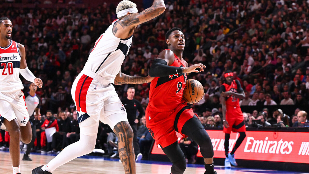 MONTREAL, CANADA - OCTOBER 06: RJ Barrett #9 of the Toronto Raptors dribbles the ball during the first half in a preseason NBA game against the Washington Wizards at the Bell Centre on October 6, 2024 in Montreal, Quebec, Canada. The Toronto Raptors defeated the Washington Wizards 125-98.