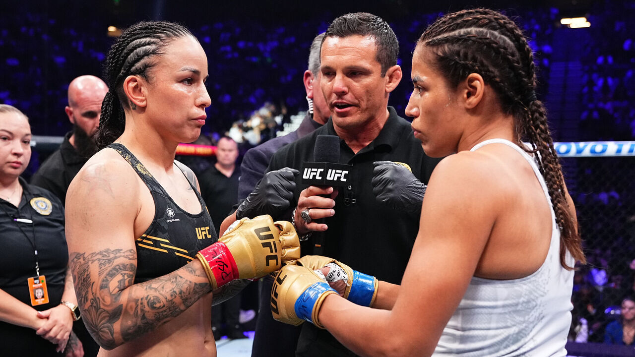 SALT LAKE CITY, UTAH - OCTOBER 05: (L-R) Opponents Raquel Pennington and Julianna Pena face off prior to the UFC bantamweight championship fight during the UFC 307 event at Delta Center on October 05, 2024 in Salt Lake City, Utah.