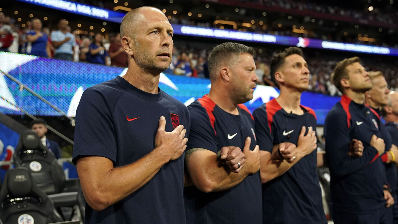 USA's coach Gregg Berhalter lines up for the national anthem ahead during the Conmebol 2024 Copa America tournament group C football match between Panama and USA at Mercedes Benz Stadium in Atlanta, Georgia, on June 27, 2024.