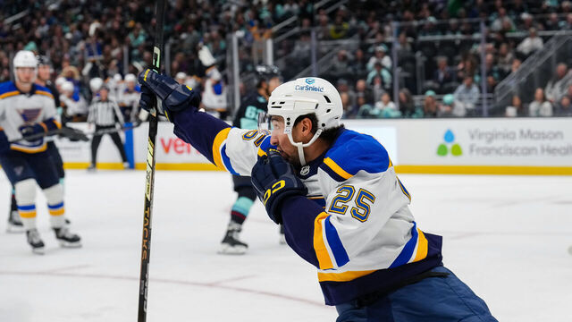 SEATTLE, WASHINGTON - OCTOBER 08: Jordan Kyrou #25 of the St. Louis Blues celebrates after scoring his second goal during the second period of a game against the Seattle Kraken at Climate Pledge Arena on October 8, 2024 in Seattle, Washington.