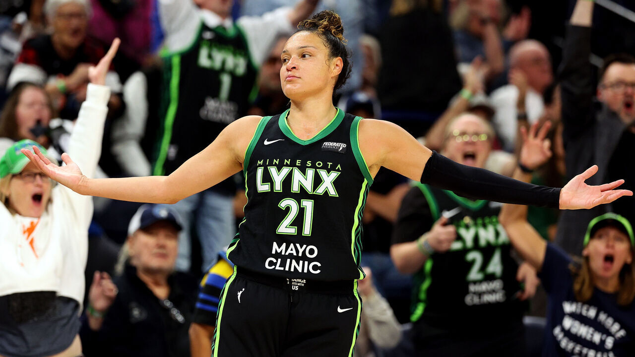 MINNEAPOLIS, MINNESOTA - OCTOBER 08: Kayla McBride #21 of the Minnesota Lynx celebrates her basket against the Connecticut Sun in the first quarter of Game Five of the Semi-Finals during the WNBA Playoffs at Target Center on October 08, 2024 in Minneapolis, Minnesota.