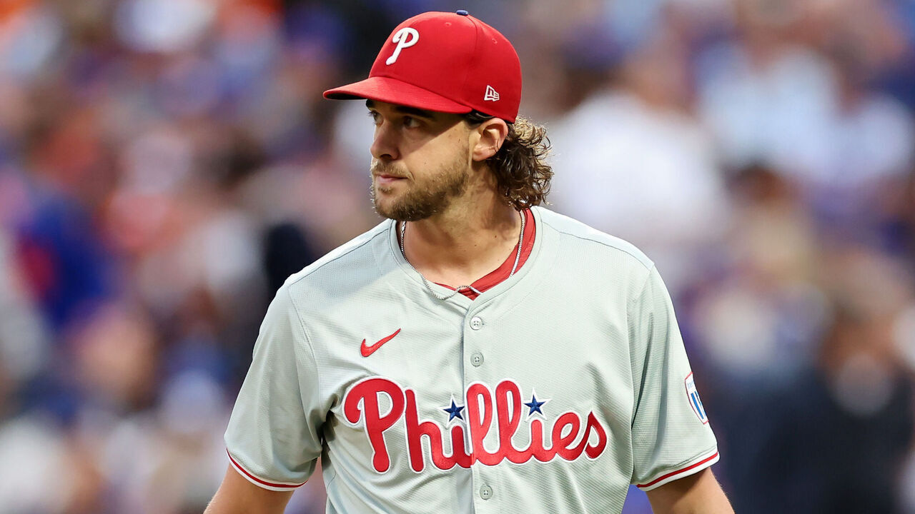 NEW YORK, NEW YORK - OCTOBER 08: Aaron Nola #27 of the Philadelphia Phillies reacts in the third inning against the New York Mets during Game Three of the Division Series at Citi Field on October 08, 2024 in New York City.