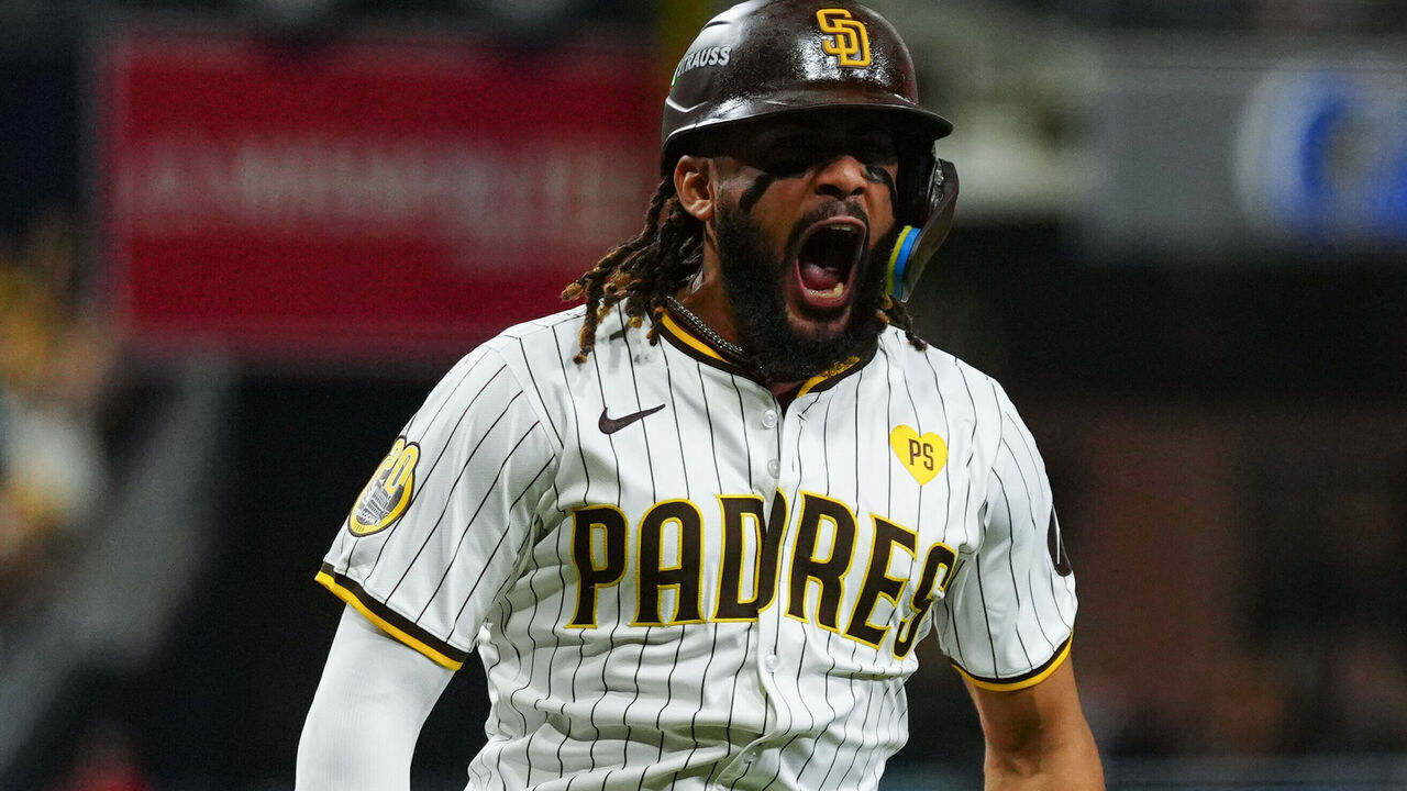 SAN DIEGO, CA - OCTOBER 08: Fernando Tatis Jr. #23 of the San Diego Padres celebrates at home plate after hitting a two-run home run in the second inning during Game 3 of the Division Series presented by Booking.com between the Los Angeles Dodgers and the San Diego Padres at Petco Park on Tuesday, October 8, 2024 in San Diego, California.