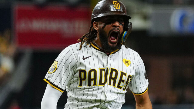 SAN DIEGO, CA - OCTOBER 08: Fernando Tatis Jr. #23 of the San Diego Padres celebrates at home plate after hitting a two-run home run in the second inning during Game 3 of the Division Series presented by Booking.com between the Los Angeles Dodgers and the San Diego Padres at Petco Park on Tuesday, October 8, 2024 in San Diego, California.