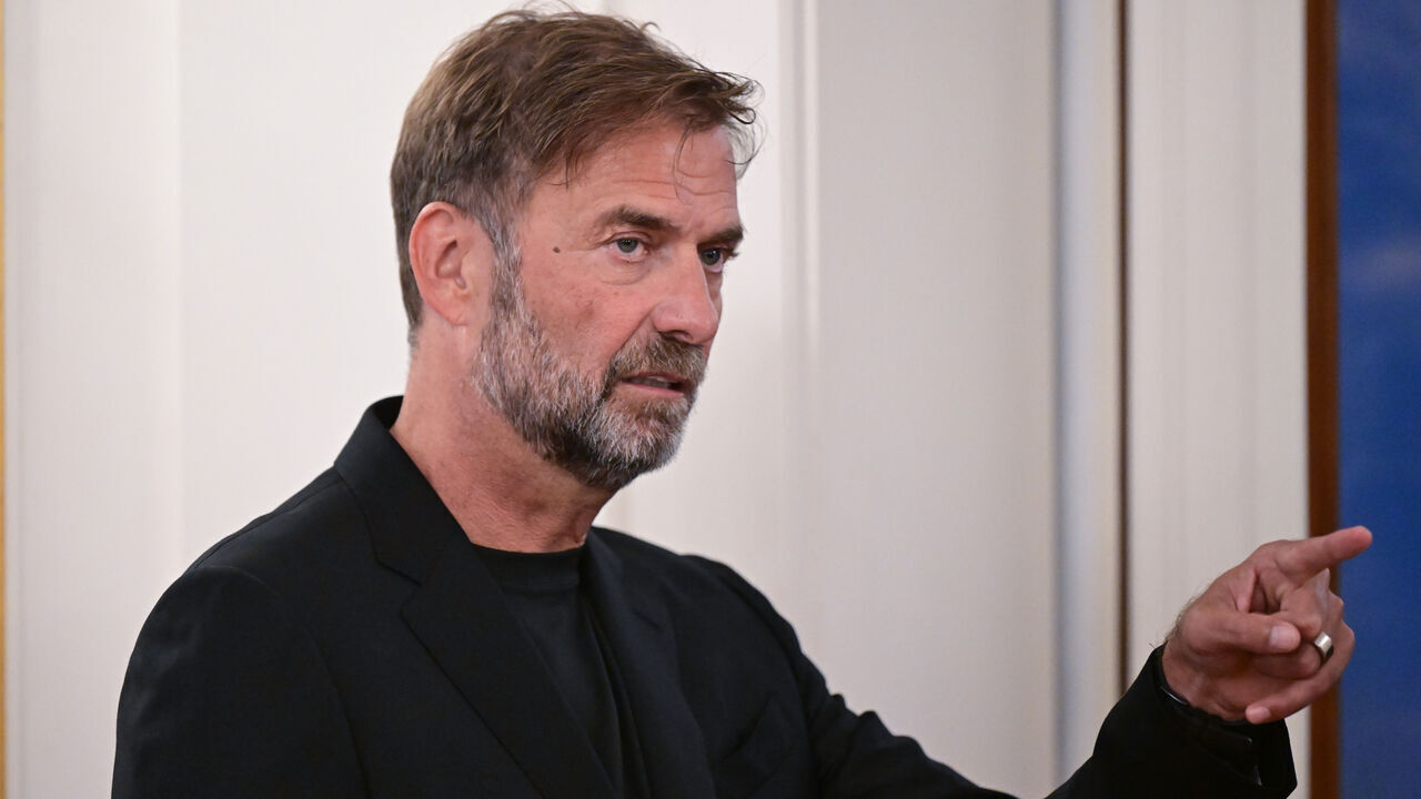 08 October 2024, Baden-Württemberg, Stuttgart: Soccer coach Jürgen Klopp receives the Order of Merit of the State of Baden-Württemberg. Born in Stuttgart, he received the award for his wide-ranging social commitment outside of sport. Photo: Bernd Weißbrod/dpa