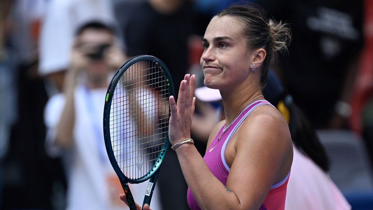 Belarus's Aryna Sabalenka celebrates after beating Czech Republic's Katerina Siniakova during their women's singles match at the Wuhan Open tennis tournament in Wuhan, China's Hubei province on October 9, 2024.