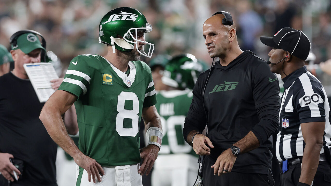 EAST RUTHERFORD, NEW JERSEY - SEPTEMBER 19: (NEW YORK DAILIES OUT) Aaron Rodgers #8 and head coach Robert Saleh of the New York Jets in action against the New England Patriots at MetLife Stadium on September 19, 2024 in East Rutherford, New Jersey. The Jets defeated the Patriots 24-3.