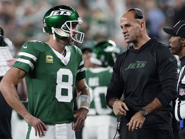 EAST RUTHERFORD, NEW JERSEY - SEPTEMBER 19: (NEW YORK DAILIES OUT) Aaron Rodgers #8 and head coach Robert Saleh of the New York Jets in action against the New England Patriots at MetLife Stadium on September 19, 2024 in East Rutherford, New Jersey. The Jets defeated the Patriots 24-3.