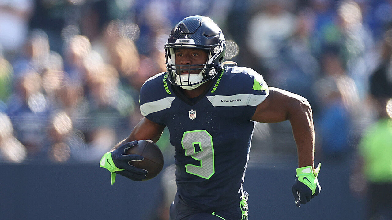 SEATTLE, WASHINGTON - OCTOBER 06: Kenneth Walker III #9 of the Seattle Seahawks runs with the ball during the third quarter against the New York Giants at Lumen Field on October 06, 2024 in Seattle, Washington.